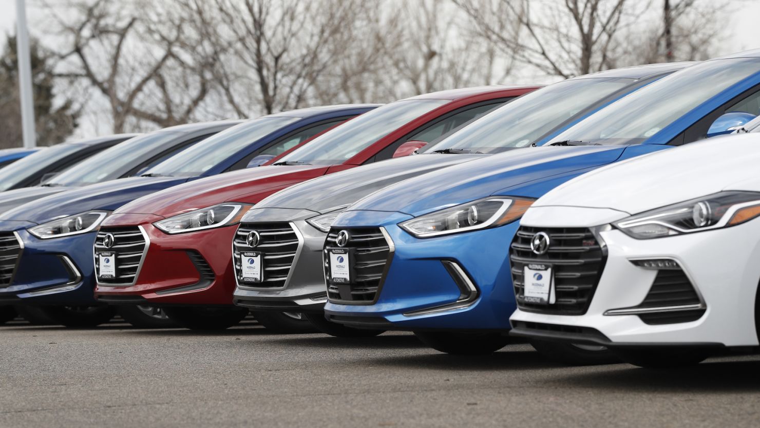 A line of unsold 2018 Elantra sedans sits outside a Hyundai dealership in Littleton, Colo. in 2018. (AP Photo/David Zalubowski)