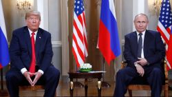 U.S. President Donald Trump, left, and Russian President Vladimir Putin sit on their chairs at the beginning of a one-on-one meeting at the Presidential Palace in Helsinki, Finland, Monday, July 16, 2018. (AP Photo/Pablo Martinez Monsivais)
