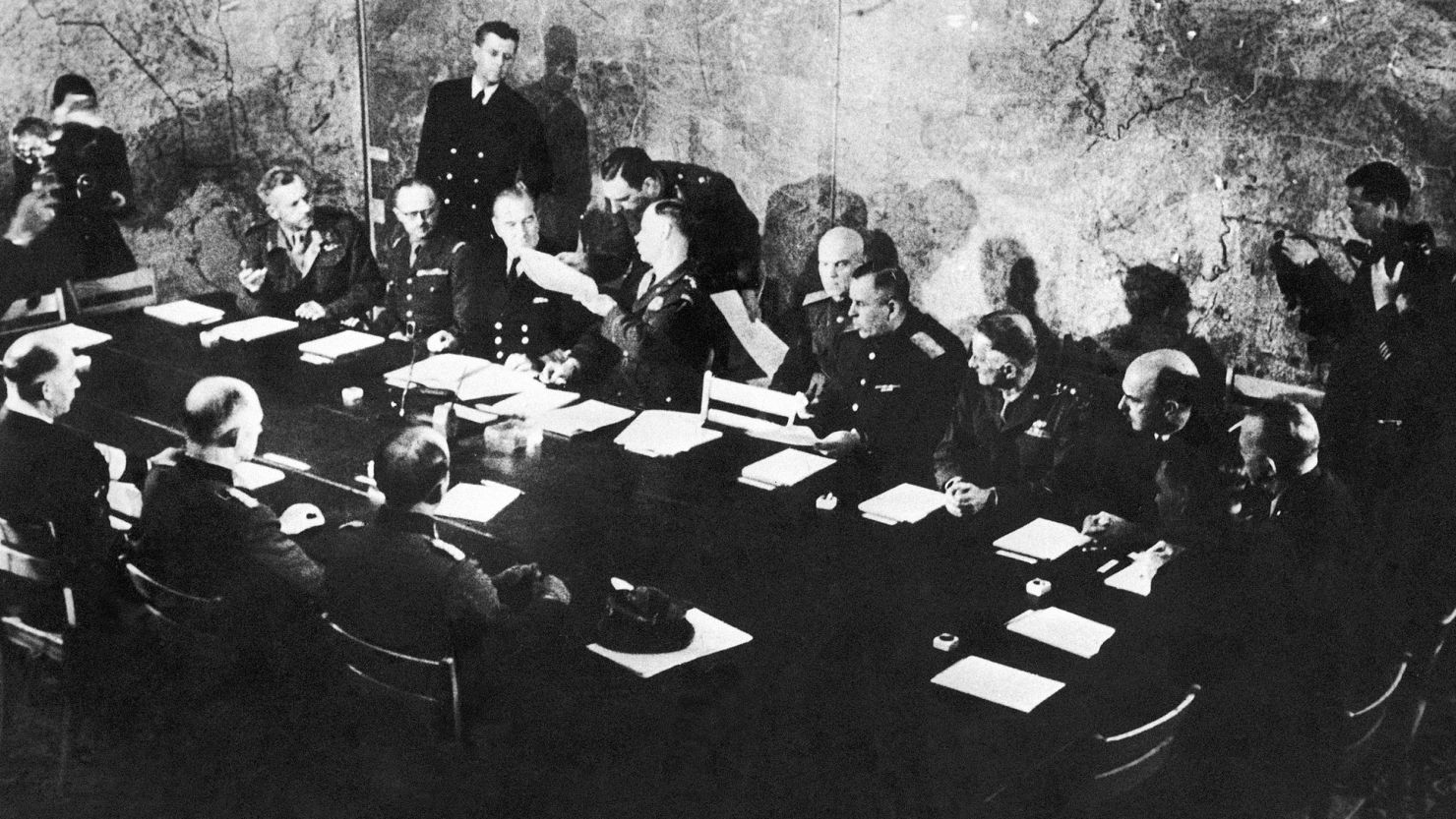 In this May 7, 1945 file photo representatives of German and Allied nations are inside a schoolhouse in Reims, France, where German delegates surrendered unconditionally.