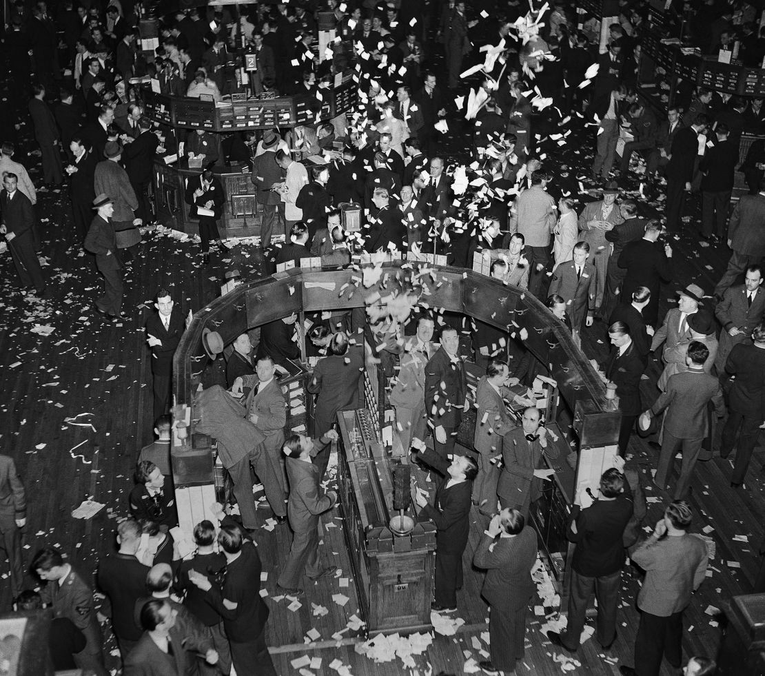 This was the scene on the floor of the New York Stock Exchange, April 7, 1939 as the market closed an active session after the Good Friday holiday. Weary clerks produced this shower of paper at the closing gong.
