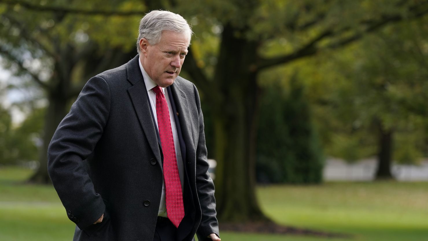 White House chief of staff Mark Meadows walks on the South Lawn of the White House in Washington, Friday, Oct. 30, 2020, before President Donald Trump's departure on Marine One.