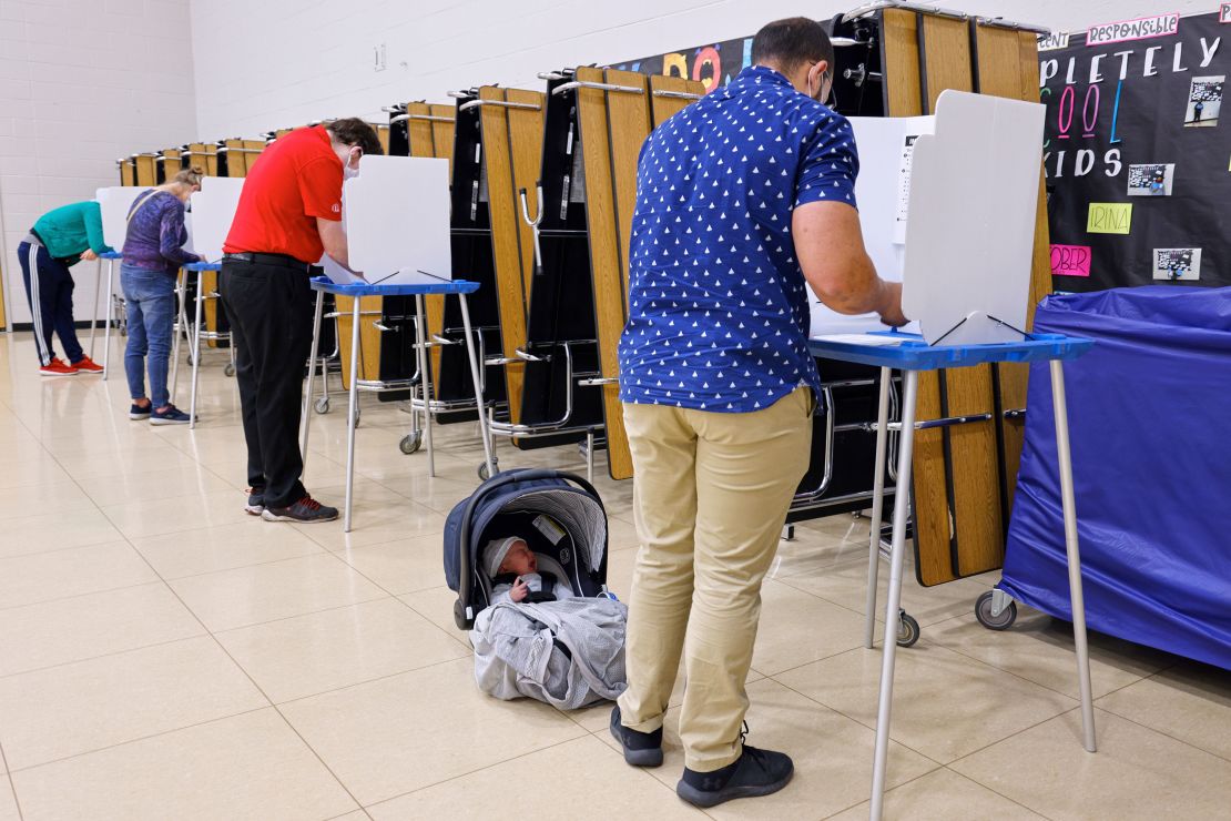 Voters fill out their ballots at a polling place in Omaha on November 3, 2020.