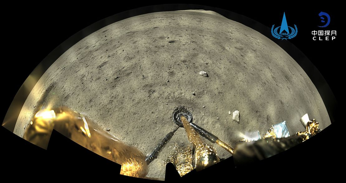 An image taken by the panoramic camera aboard Chang'e-5's lander-ascender combination shows the surface of the moon after the probe landed.