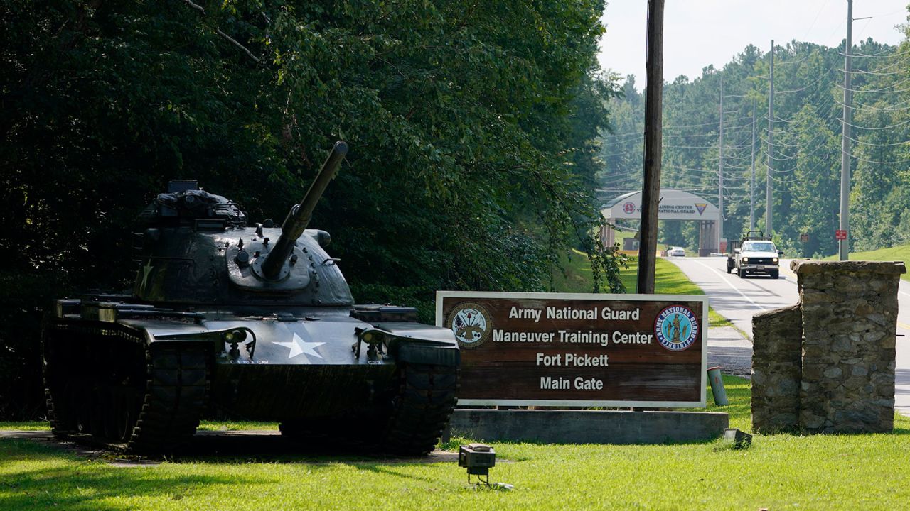 Traffic moves toward a tank and sign at the main entrance to Fort Pickett Wednesday, Aug. 25, 2021, in Blackstone, Virginia. The base was renamed to Fort Barfoot, but now will be renamed again to Fort Pickett.  The latest version of the name will be named in honor of Distinguished Service Cross recipient 1st Lt. Vernon W. Pickett for his extraordinary heroism during World War II.