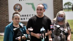 On August 27, 2020, former inmate Robert DuBoise, 56, meets reporters with his sister Harriet, left, and mother Myra, right, outside the Hardee County Correctional Institute after serving 37 years in prison, when officials discovered new evidence that proved his innocence in Hardee County, Fla.