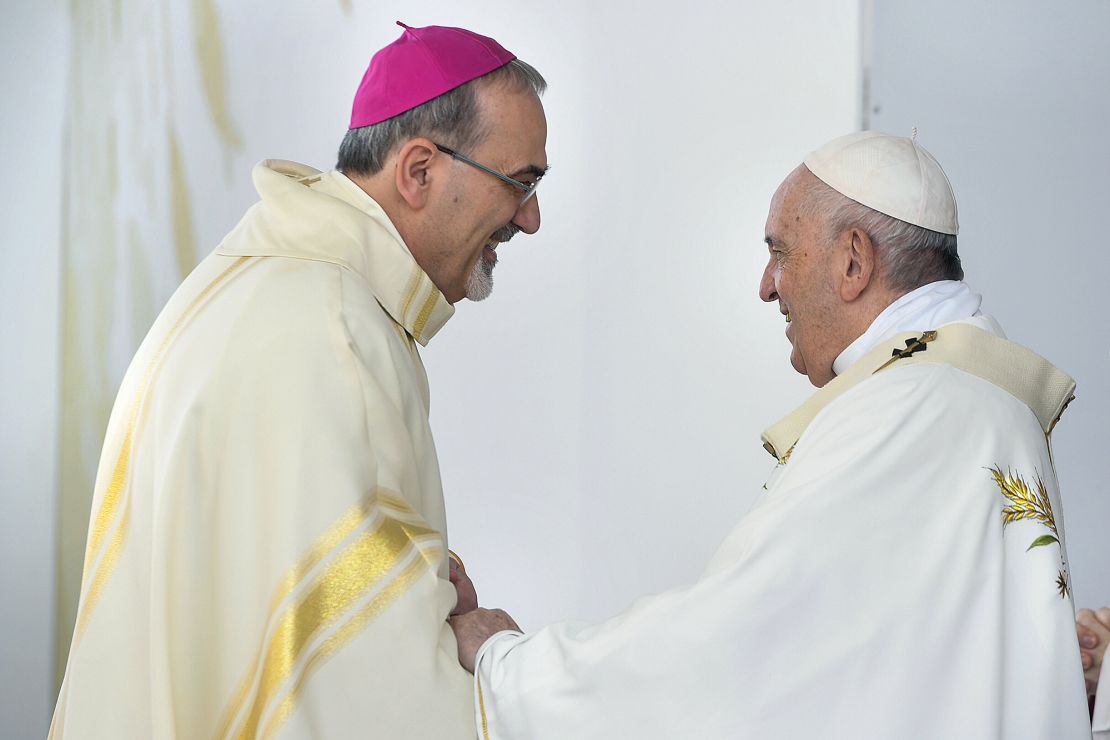 Pizzaballa and Pope Francis speak at a Mass in the Cypriot capital of Nicosia in 2021.