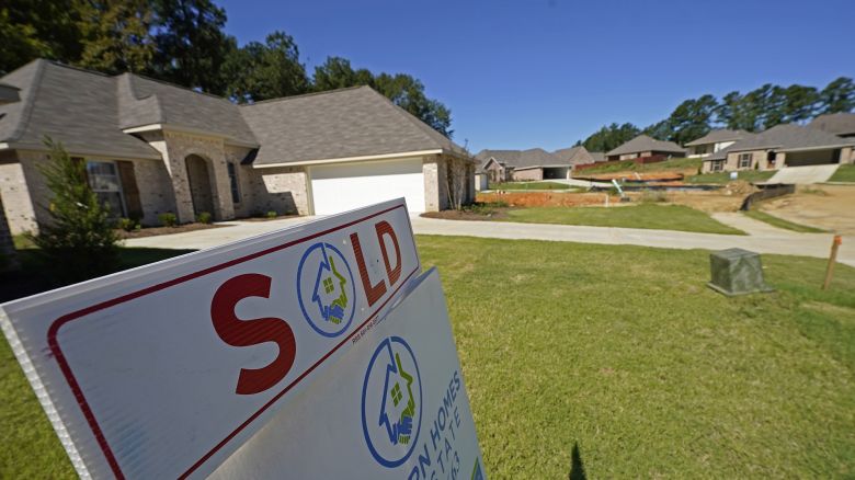 A "Sold" sign is on display on the lawn of a new house in Pearl, Miss., Thursday, Sept. 23, 2021.