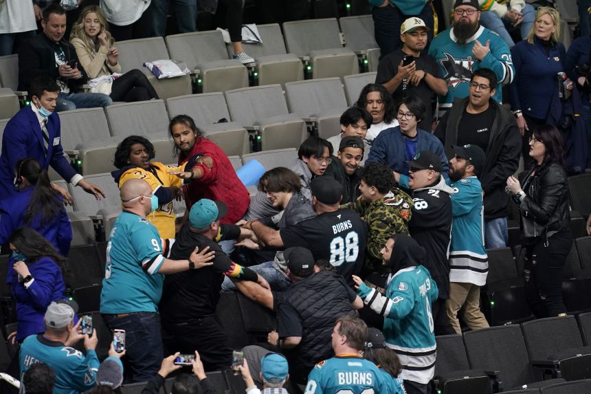 A fight breaks out in the stands during an NHL game in San Jose, California, in 2022.