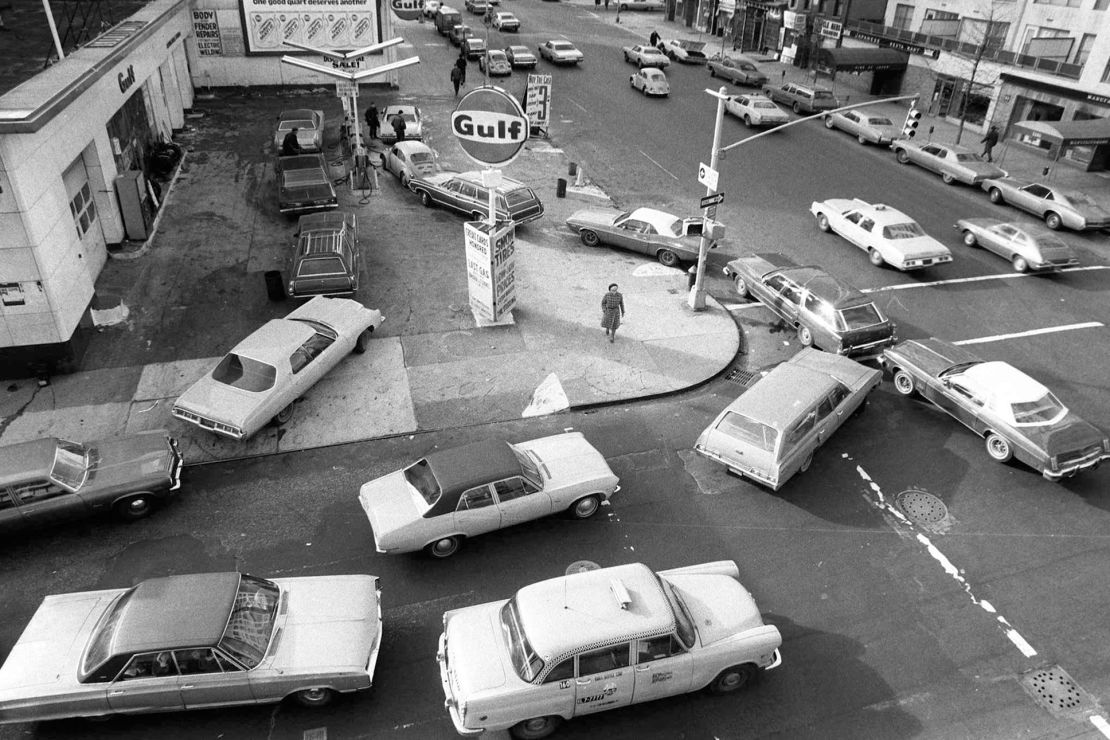 Cars line up in two directions at a gas station in New York City on December 23, 1973.