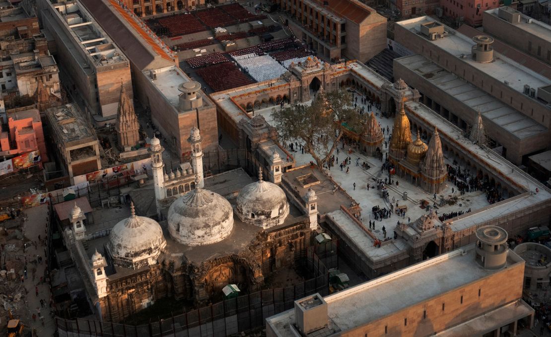 The Gyanvapi mosque, left, and Kashiviswanath Temple on the banks of the river Ganges in Varanasi, India, December 12, 2021.