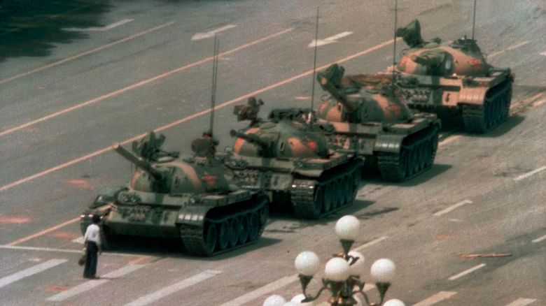 In this June 5, 1989, file photo, a Chinese man stands alone to block a line of tanks heading east on Beijing's Changan Blvd. in Tiananmen Square. An online snafu involving China’s most popular e-commerce livestreamer and a cake decorated to look like a tank, referencing the iconic Tank Man photo taken during the 1989 student-uprising, has raised questions among some Chinese over the violent crackdown on pro-democracy protests in Beijing's Tiananmen Square on June 4, 1989.