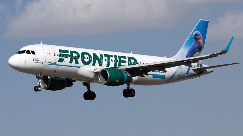 A Frontier Airlines plane files on February 15, 2022.