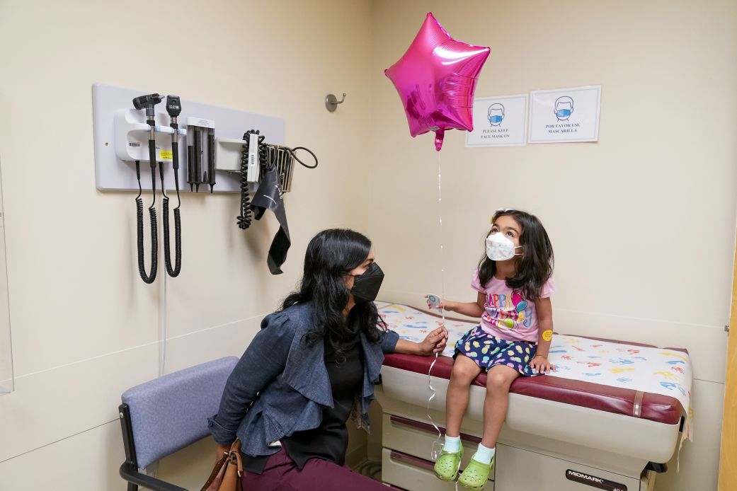 A 3-year-old girl gets her Covid-19 vaccine at a doctor's office in the Bronx, New York. (AP Photo/Mary Altaffer)