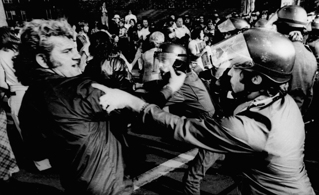 Helmeted police move in to break up a crowd of nearly 800 people at an anti-school busing demonstration in Boston on October 7, 1974.