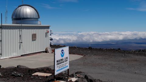 FILE - This 2019 photo provided by NOAA shows the Mauna Loa Atmospheric Baseline Observatory, high atop Hawaii's largest mountain in order to sample well-mixed background air free of local pollution. Mauna Loa’s volcano eruption has temporarily knocked off power to the world’s premier station that measures heat-trapping carbon dioxide in the atmosphere, but officials said that there are hundreds of other carbon dioxide monitoring sites across the globe. (Susan Cobb/NOAA Global Monitoring Laboratory via AP, File)