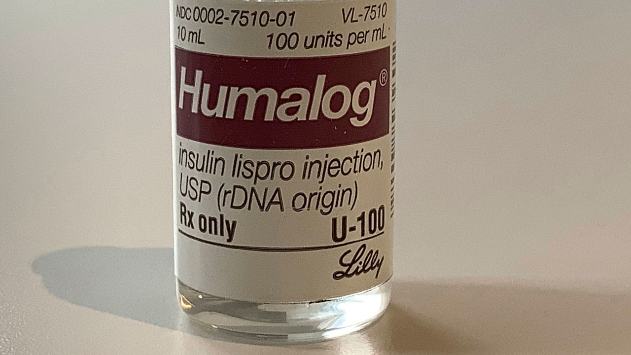 This Wednesday, March 1, 2023 photo shows a vial of Eli Lilly's Humalog insulin in New York. Eli Lilly will cut prices for some older insulins later this year and immediately give more patients access to a cap on costs they pay to fill prescriptions. The moves announced March 1, 2023 promise critical relief to some people with diabetes who can face annual costs of more than $1,000 for insulin they need in order to live. Lillyâs changes also come as lawmakers and patient advocates pressure drugmakers to do something about soaring prices. (AP Photo/Pablo Salinas)