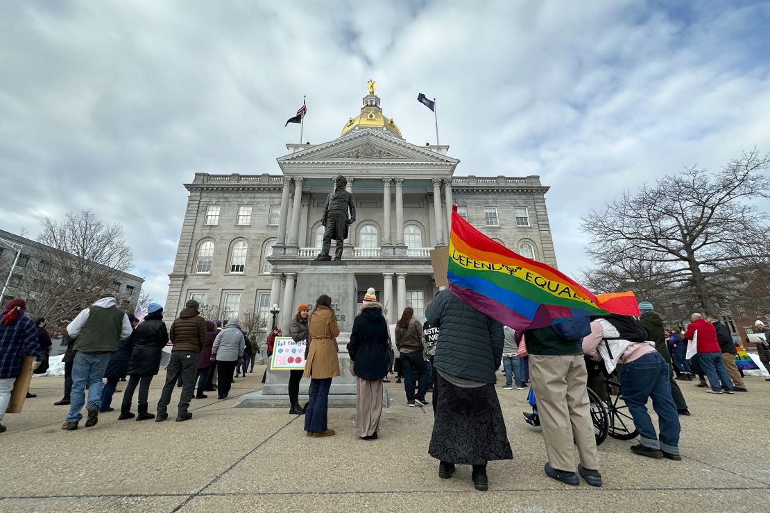 Advocates for transgender youth rally outside the New Hampshire State House, in Concord on Tuesday, March 7, 2023.