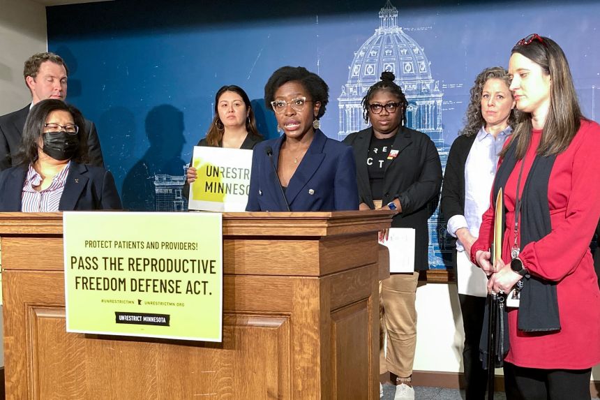 State Rep. Esther Agbaje speaks in March 2023 at a news conference ahead of a vote at the Minnesota State Capitol in St. Paul.