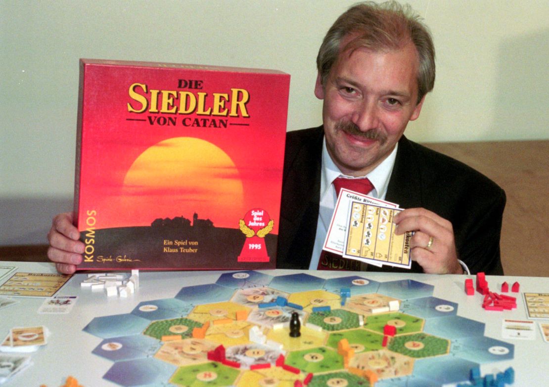 Klaus Teuber, a dental technician from Darmstadt, presents his game, "The Settlers of Catan," on September 29, 1995, in Frankfurt, Germany.