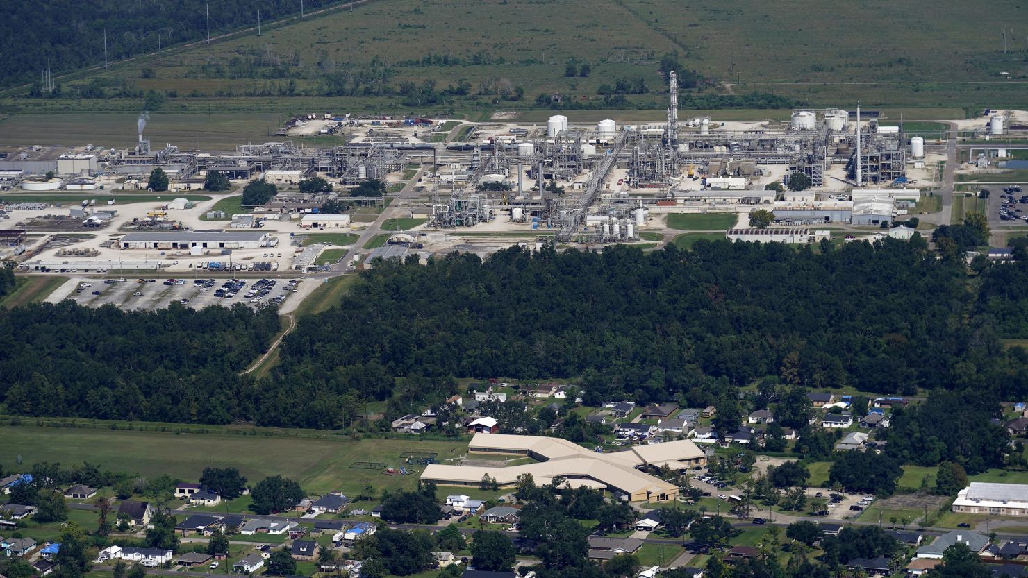 An elementary school and residential neighborhoods sit near the Denka Performance Elastomer Plant in Louisiana. New EPA rules are designed to protect neighborhoods near facilities that release airborne toxins.