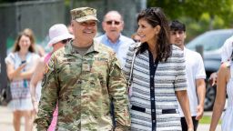 Republican presidential candidate Nikki Haley walks with her husband Maj. Michael Haley following a deployment ceremony for his unit of the South Carolina National Guard on Saturday, June 17, 2023, at Johnson Hagood Stadium in Charleston, S.C. Michael Haley's year-long deployment to Africa will encompass much of his wife's campaign for the 2024 GOP presidential nomination. (AP Photo/Mic Smith)