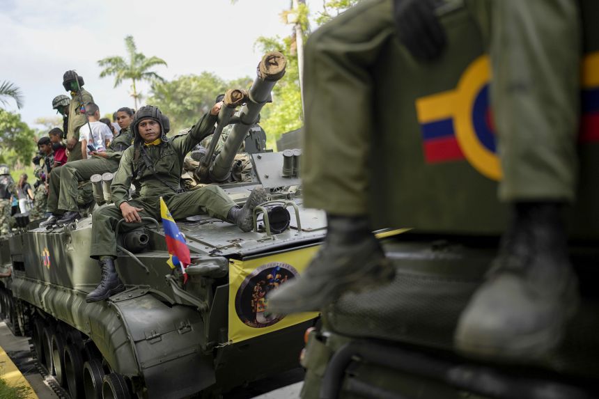 Soldiers rest after participating in the Independence Day military parade in Caracas, Venezuela, July 5, 2023.