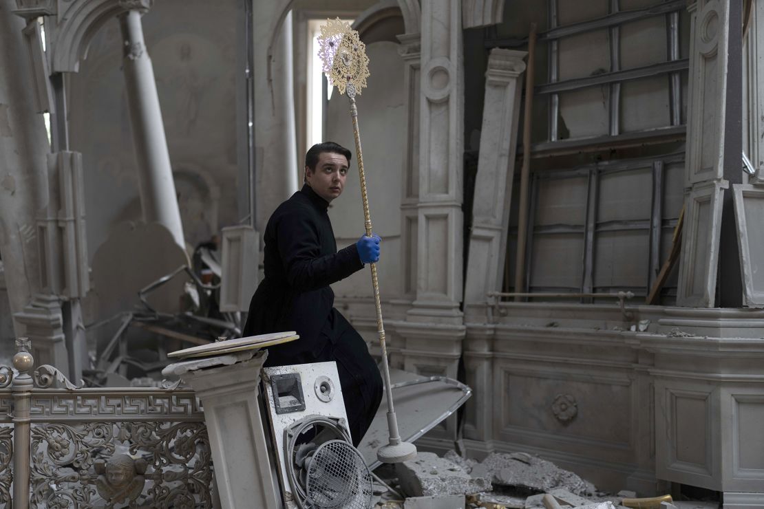 Church personnel salvage items from Odesa Transfiguration Cathedral in the southern Ukrainian port city after it was heavily damaged in Russian missile attacks on July 23, 2023.