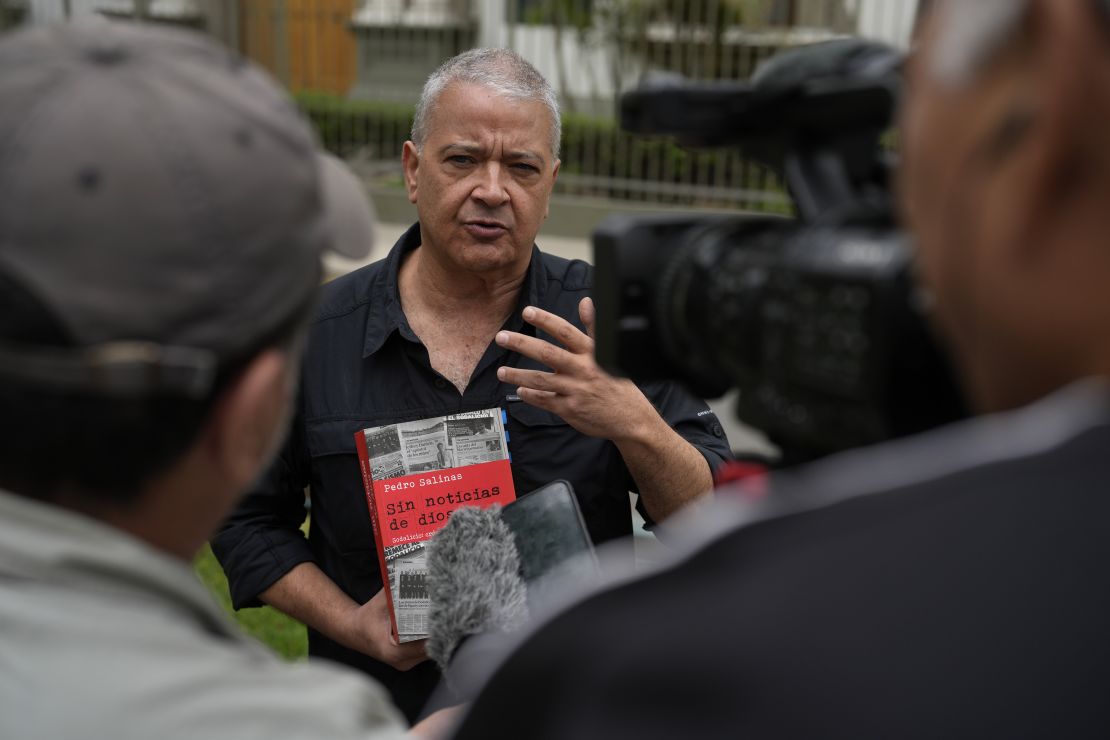 Pedro Salinas speaks with the press outside the Nunciatura Apostolica after meeting with Vatican investigators about alleged abuse by the Catholic lay group Sodalitium Christianae Vitae (SCV) in Lima, Peru, Tuesday, July 25, 2023.