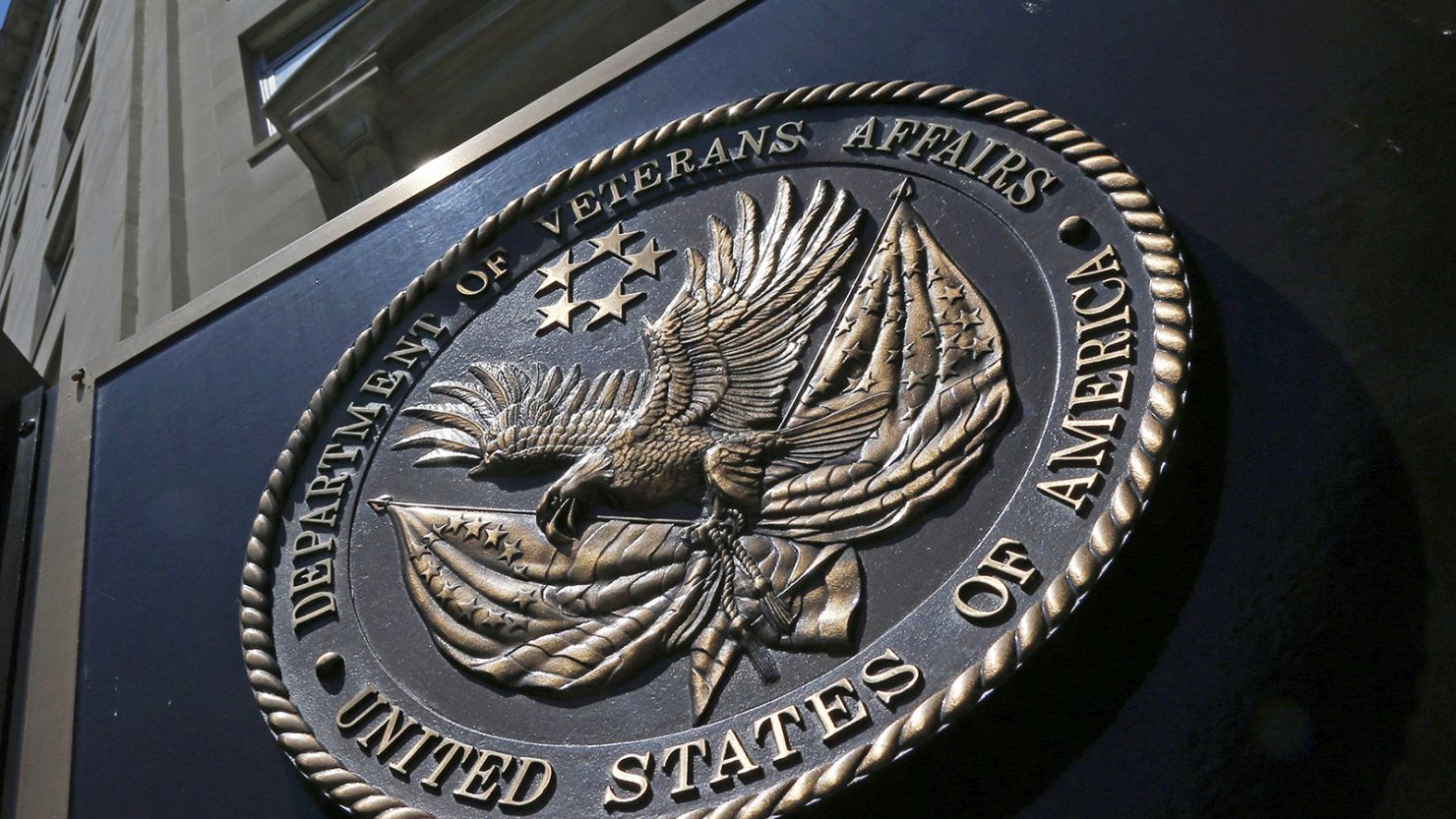 A seal is displayed on the front of the Veterans Affairs Department building in Washington in June 2013.