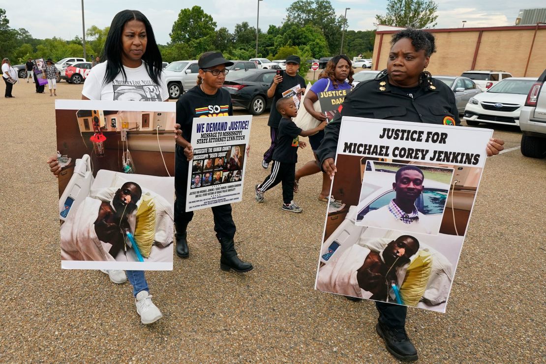 Activists march towards the Rankin County Sheriff's Office in Brandon, Mississippi on July 5, 2023, calling for the termination and prosecution of Rankin County Sheriff Bryan Bailey.