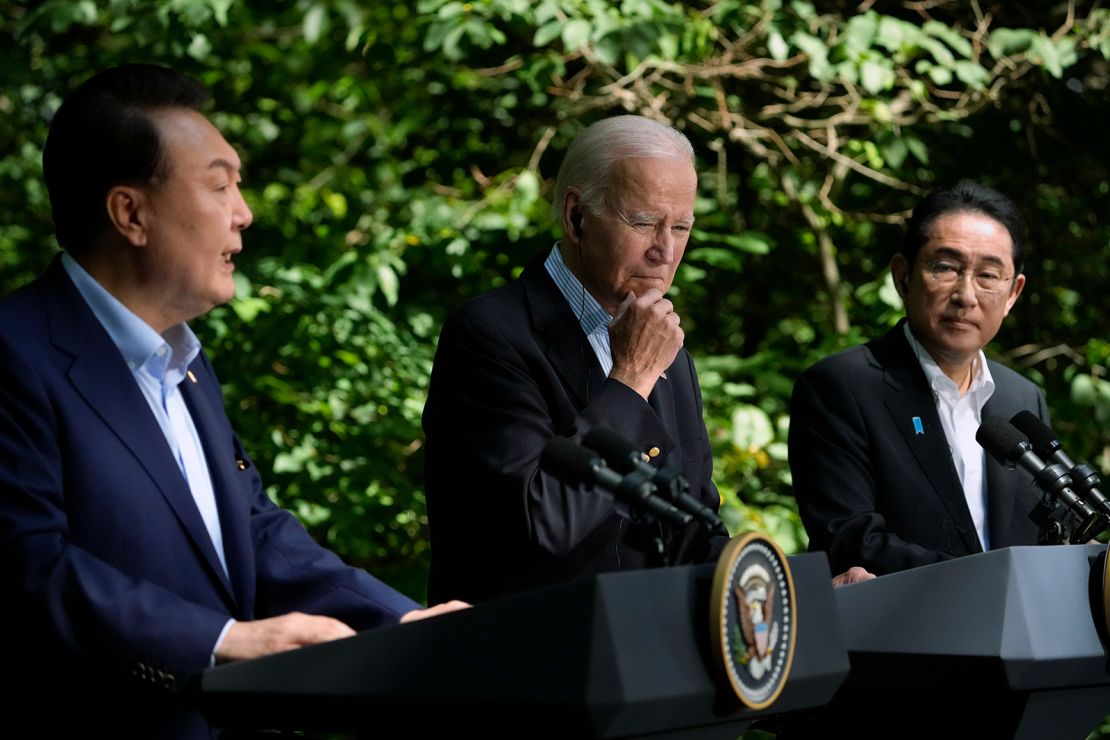 President Joe Biden and Japan's Prime Minister Fumio Kishida (right), listen as South Korea's President Yoon Suk Yeol speaks during a news conference at Camp David on August 18, 2023.