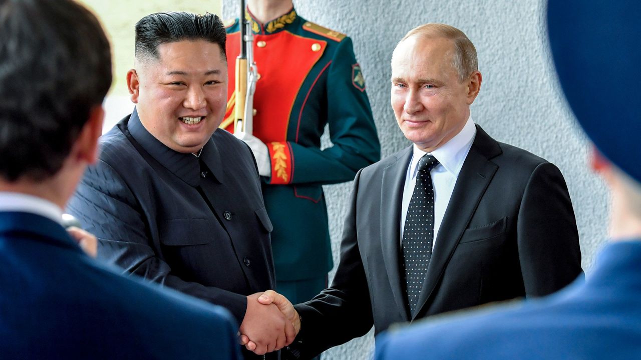 Russian President Vladimir Putin, center right, and North Korea's leader Kim Jong Un shake hands during their meeting in Vladivostok, Russia in April 2019.