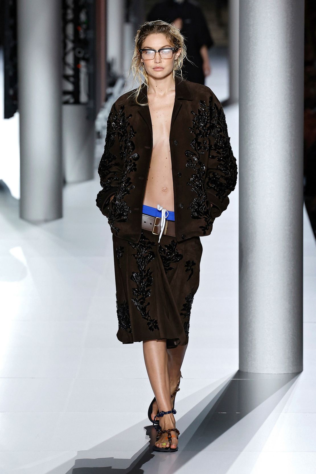 In luxe, slouchy sportswear separates, Gigi Hadid walked Miu Miu's runway.