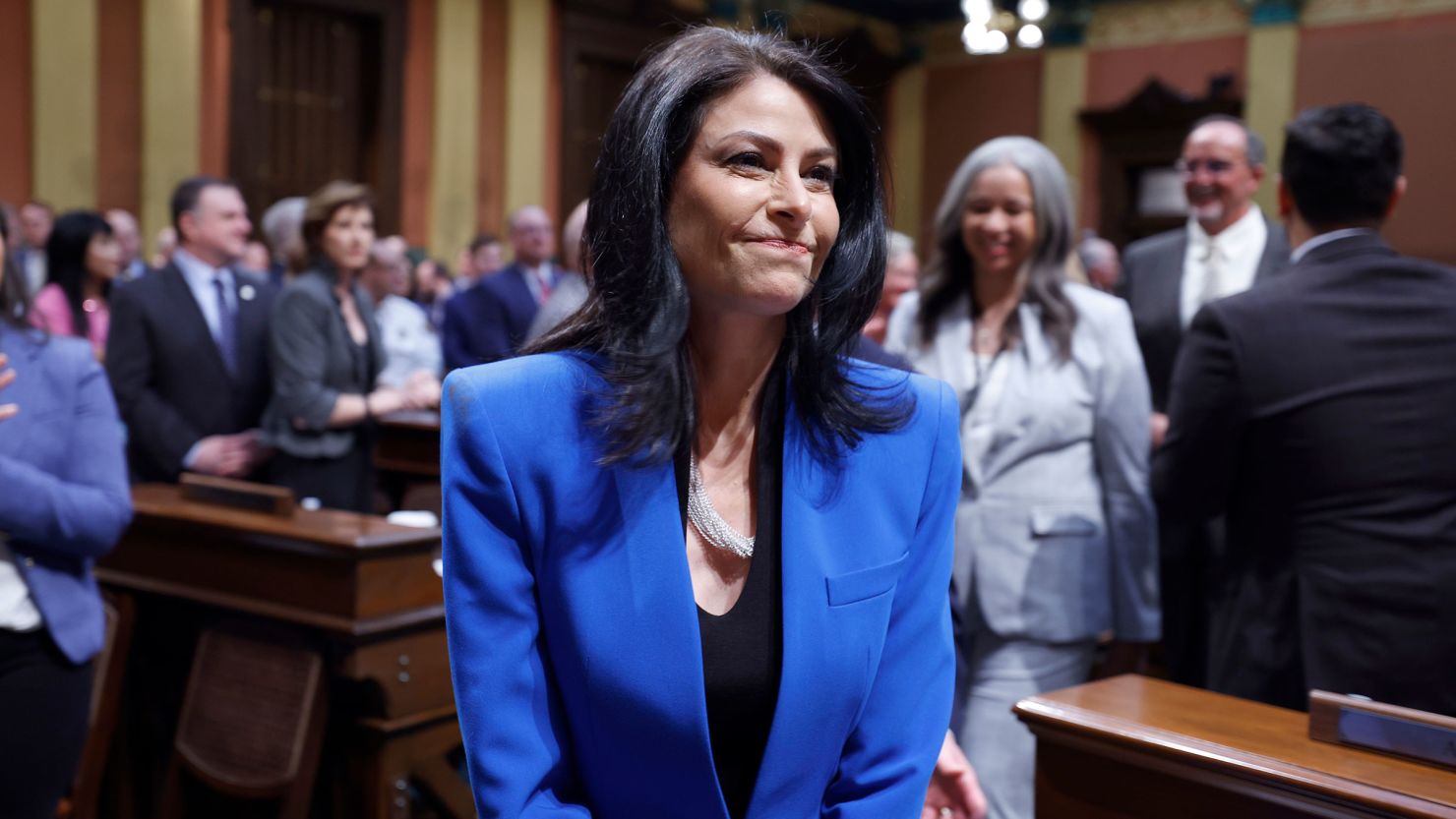 In this January 2023 photo, Attorney General Dana Nessel walks to her seat before the State of the State address in Lansing, Michigan.