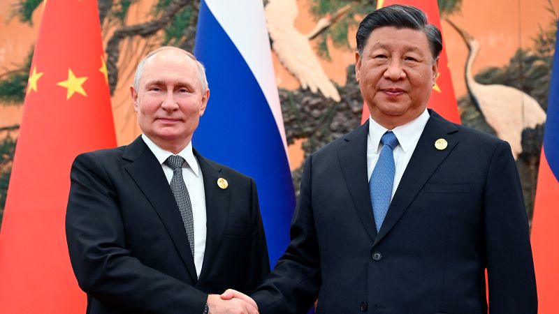 Vladimir Putin arrives in China for a state visit as Russian forces advance into Ukraine