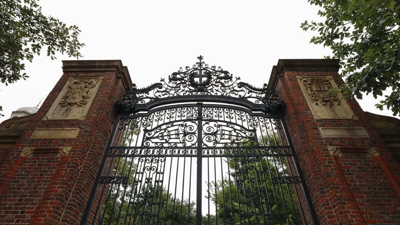 The exterior gate at Harvard University, Sunday, Sept. 10, 2023, in Cambridge, Mass.