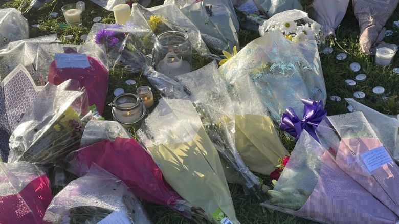 Floral tributes at Stowlawn playing fields in Wolverhampton, left following the killing of Shawn Seesahai in November 2023.