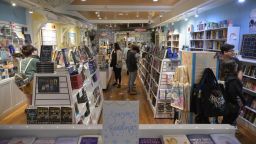 People roam the aisles of an independent bookstore in the Winter Garden Downtown Historic District, Saturday, Dec. 9, 2023, in Winter Garden, Fla.
