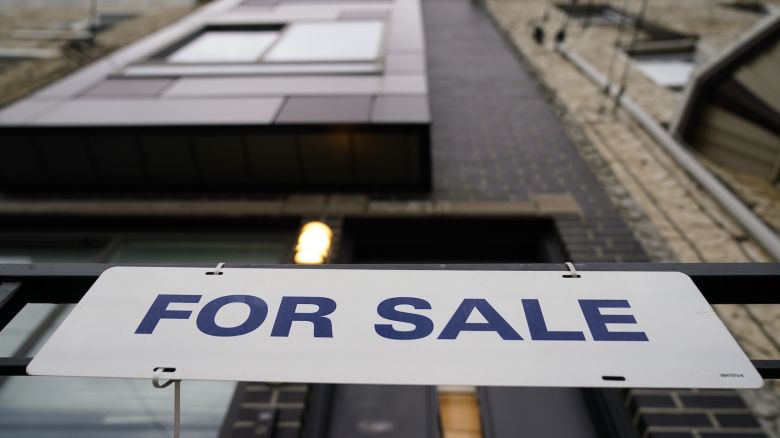 A for sale sign is posted outside a single-family home in Philadelphia, Friday, Dec. 1, 2023. On Thursday, Freddie Mac reports on this week's average U.S. mortgage rates. (AP Photo/Matt Rourke)