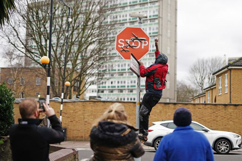 Two men arrested over alleged theft of new Banksy artwork in 