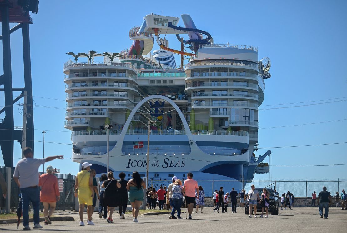 Onlookers take in the sight of the huge cruise ship docked in Ponce ahead of its inaugural voyage later this month.