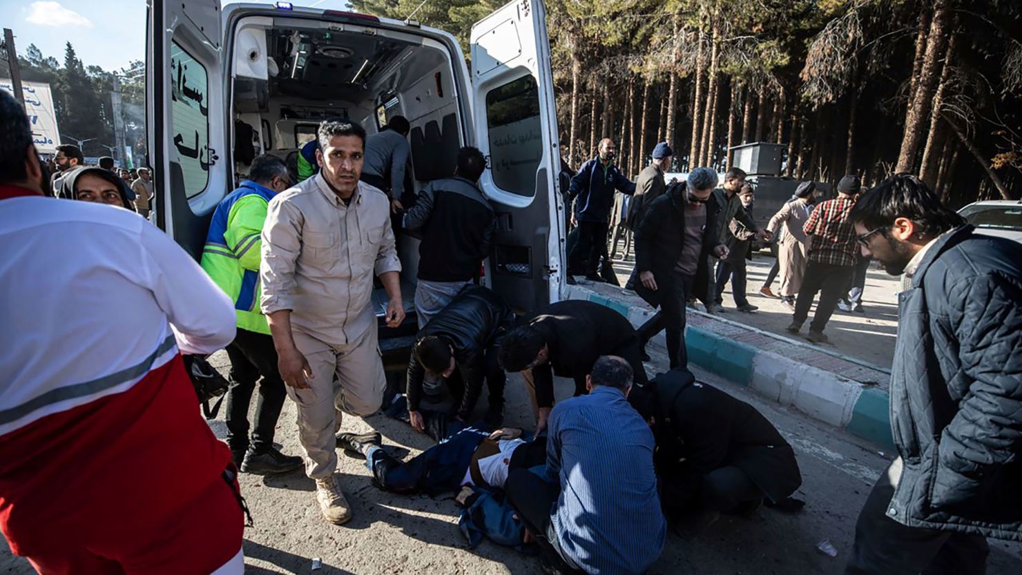 People administer aid after an explosion in Kerman, Iran, on Wednesday, January 3.