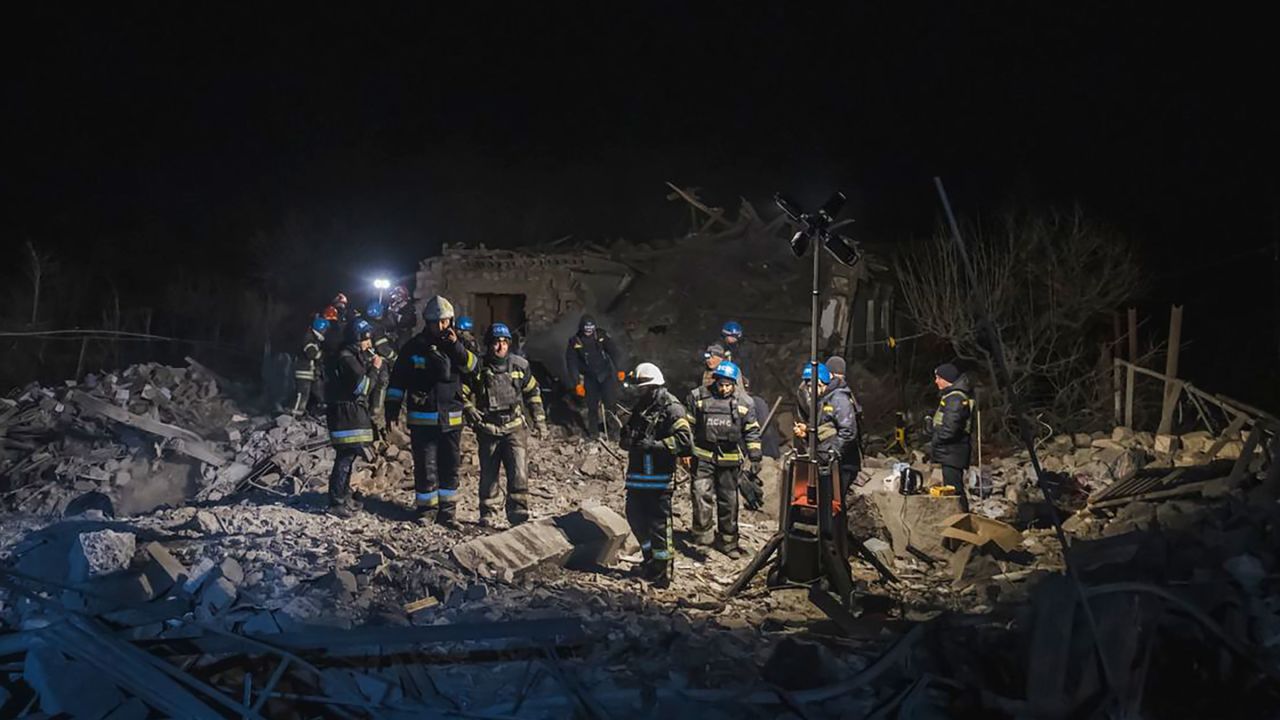 In this photo provided by the Ukrainian Emergency Service, firefighters examine the site of Russia's missile attack that hit an apartment building in Pokrovsk, Ukraine, on Saturday, January 6.