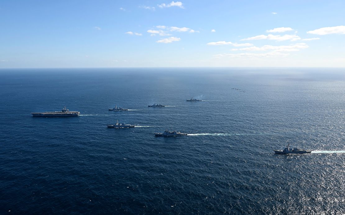 A US aircraft carrier sails with South Korea and Japan's destroyers off the southern coast of the Korean Peninsular during a 2024 joint drill.