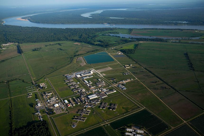 In this aerial photo, the Louisiana State Penitentiary lies along the bending Mississippi River, Friday, July 21, 2023, in Angola, Louisiana. The former 19th-century antebellum plantation once was owned by one of the largest slave traders in the US. It spans 18,000 acres – an area bigger than the island of Manhattan – and has its own ZIP code.