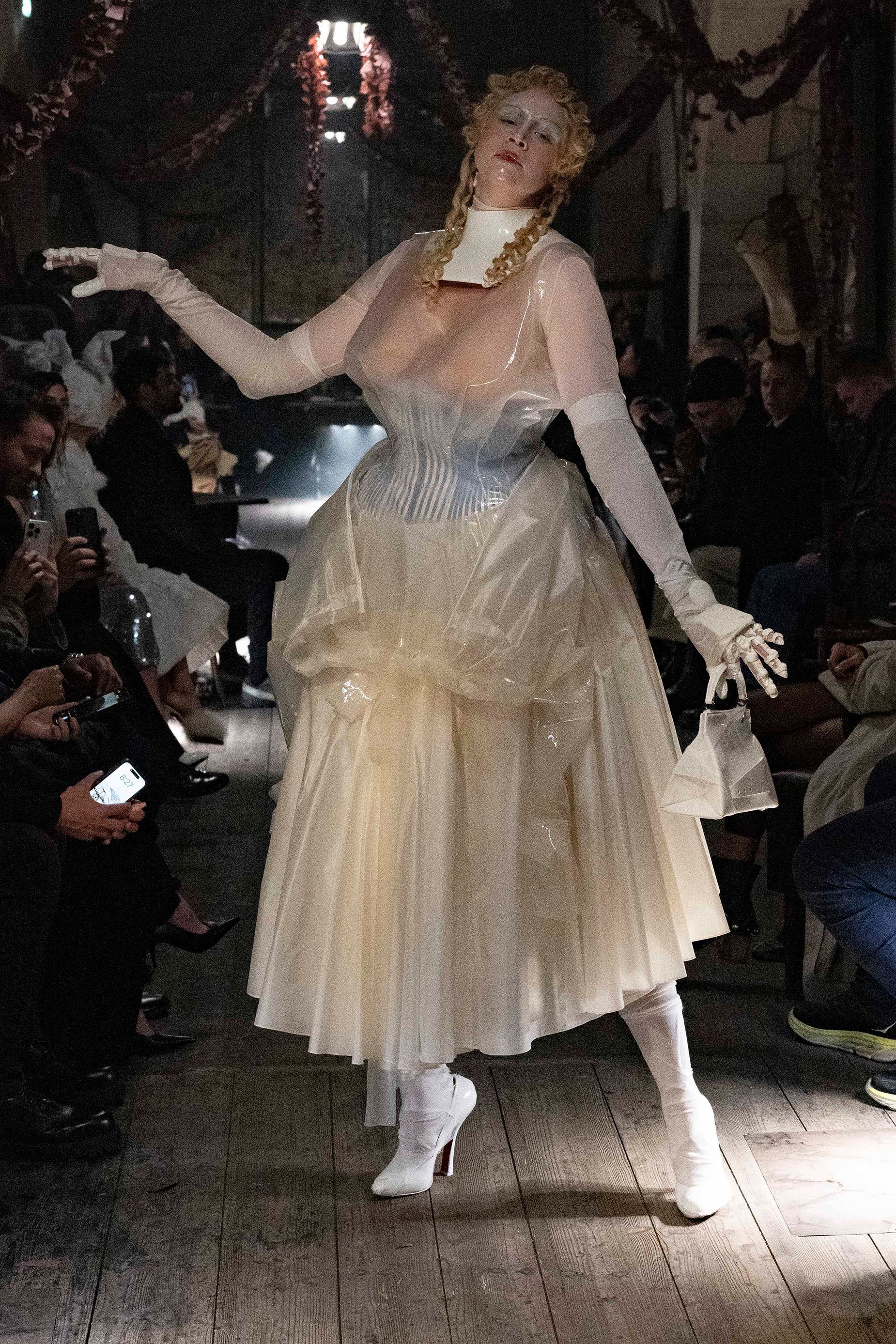 Gwendoline Christie closed John Galliano's show for Martin Margiela in a partially sheer corset-style dress.