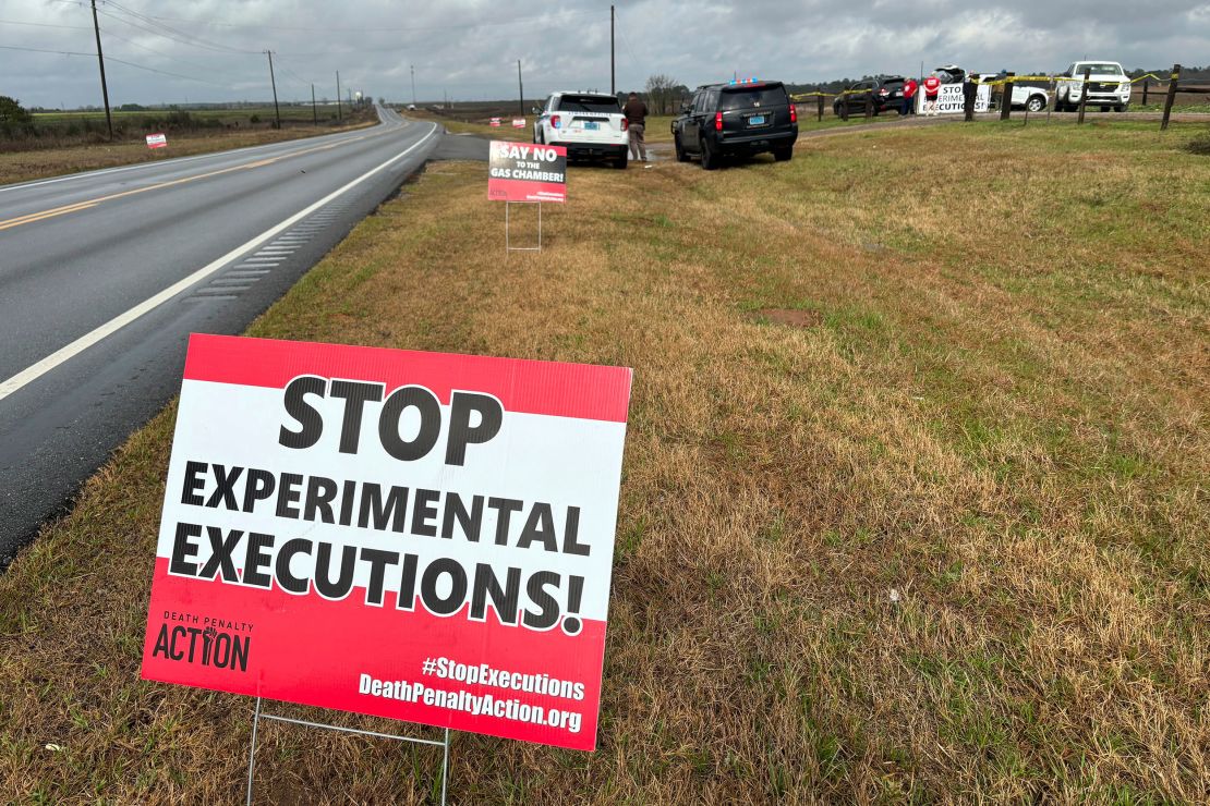 Anti-death penalty signs placed by activists line the road heading to Holman Correctional Facility in Atmore, Alabama, ahead of the 2024 execution of Kenneth Eugene Smith, the first known US inmate to die by nitrogen gas.