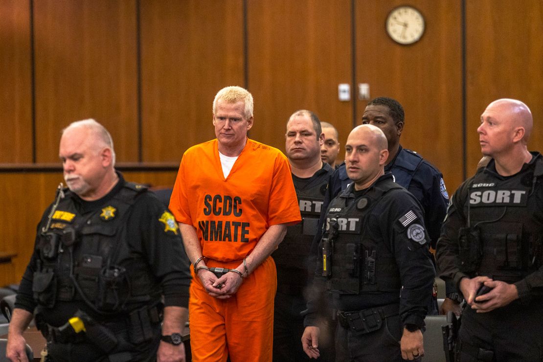 Alex Murdaugh, second from left, is brought out into the courtroom during a jury-tampering hearing at the Richland County Judicial Center, Monday, Jan. 29, 2024, in Columbia, South Carolina.