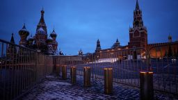 An almost empty Red Square with the St. Basil's Cathedral, left, the Kremlin Wall and the Spasskaya Tower, right, in the background are seen at dawn in Moscow, Russia, Tuesday, Jan. 30, 2024. (AP Photo/Alexander Zemlianichenko)