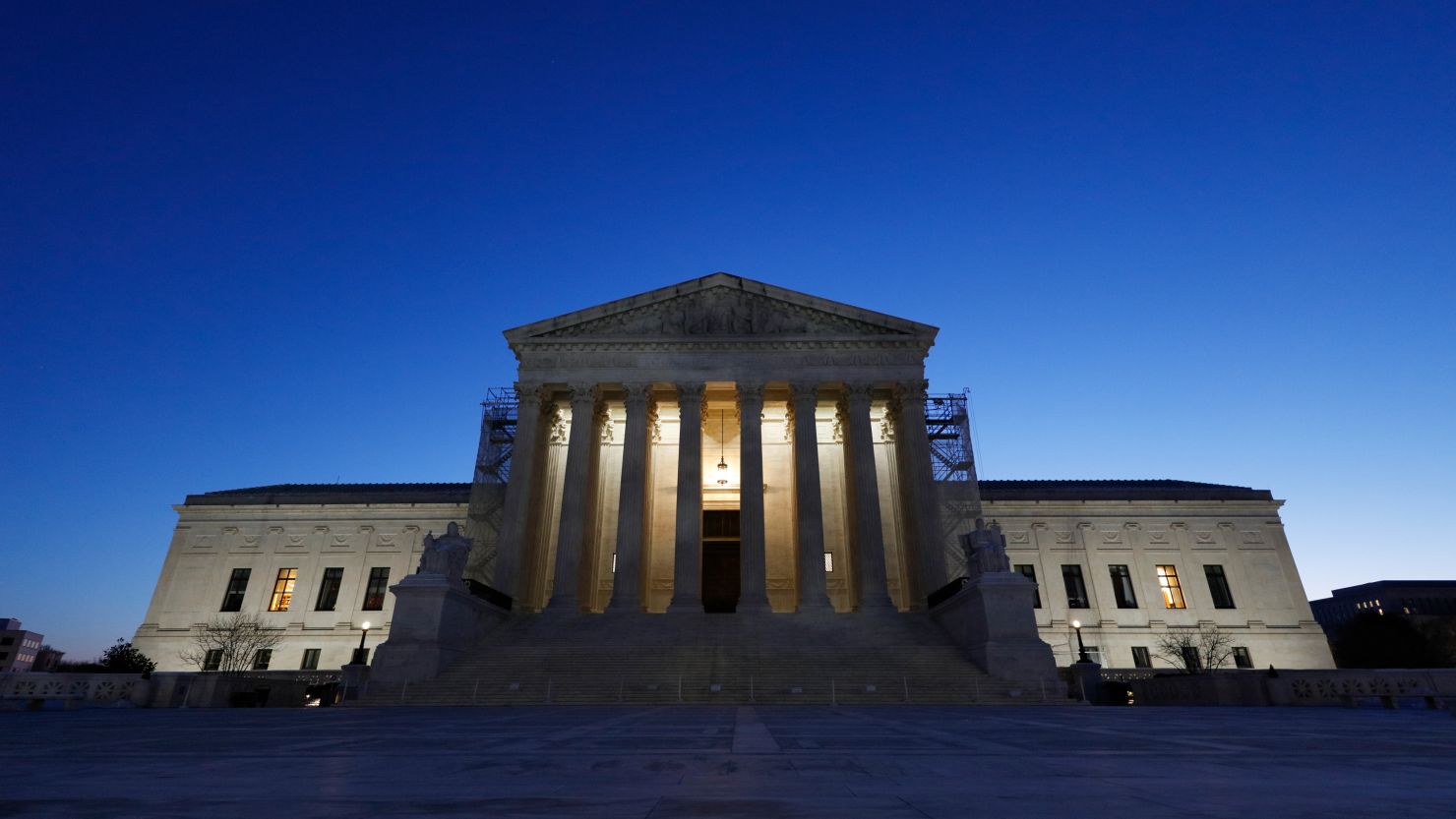 A general overall exterior view of the Supreme Court building at dawn on January 21, 2024, in Washington.